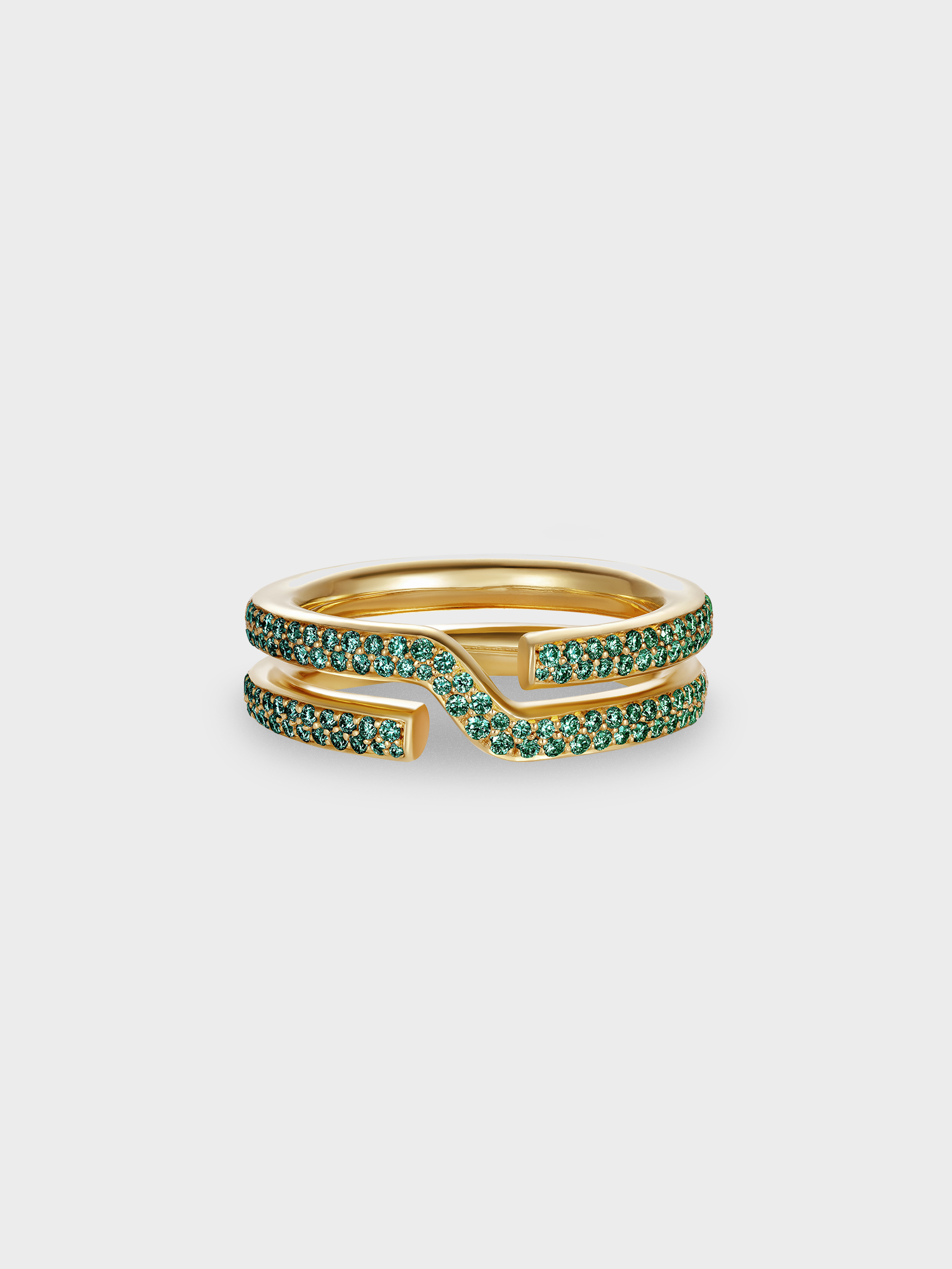 Gold keyring ring with emerald pave on a light gray background