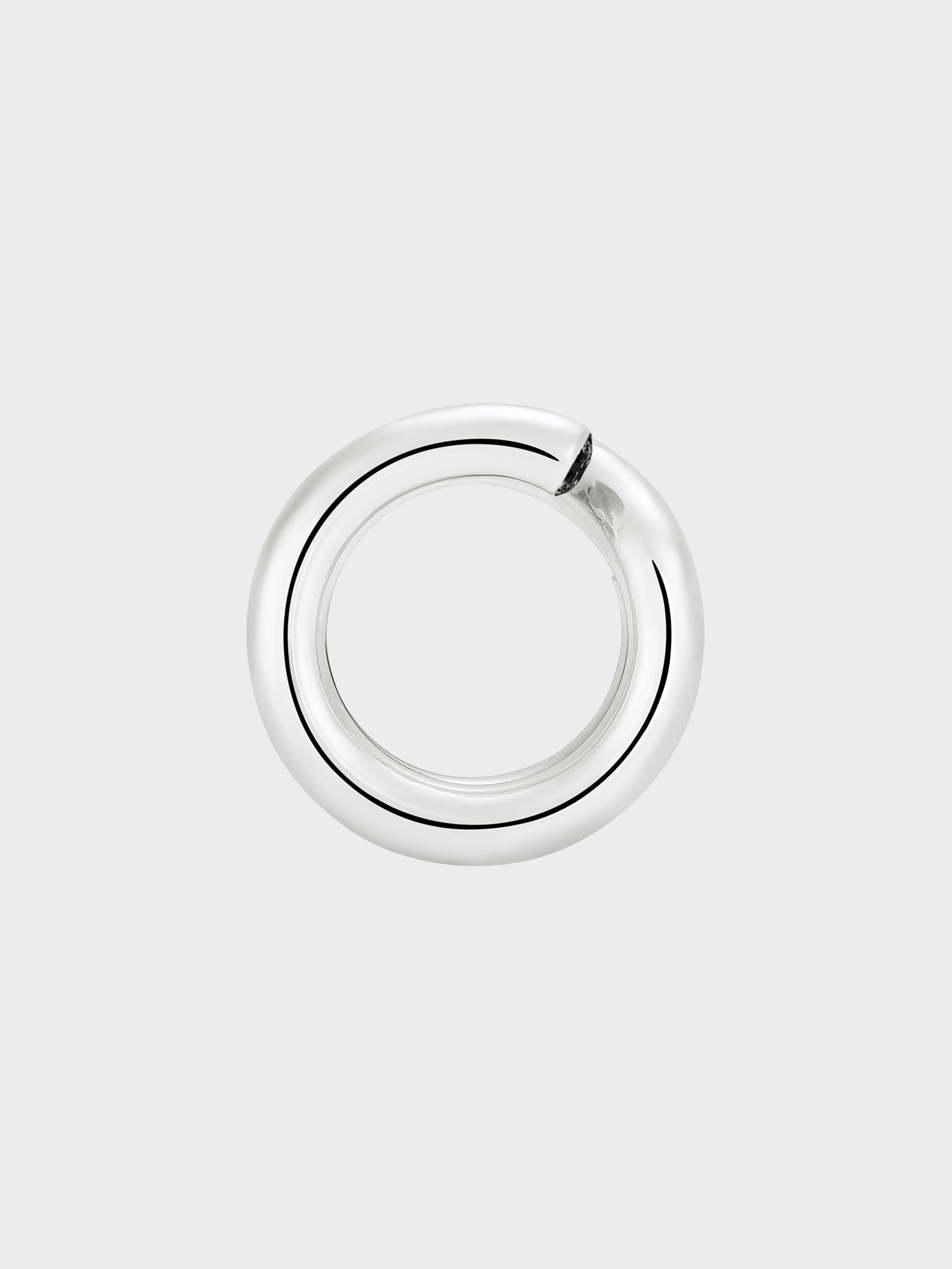 Silver keyring ring with black diamond end stone on light grey background