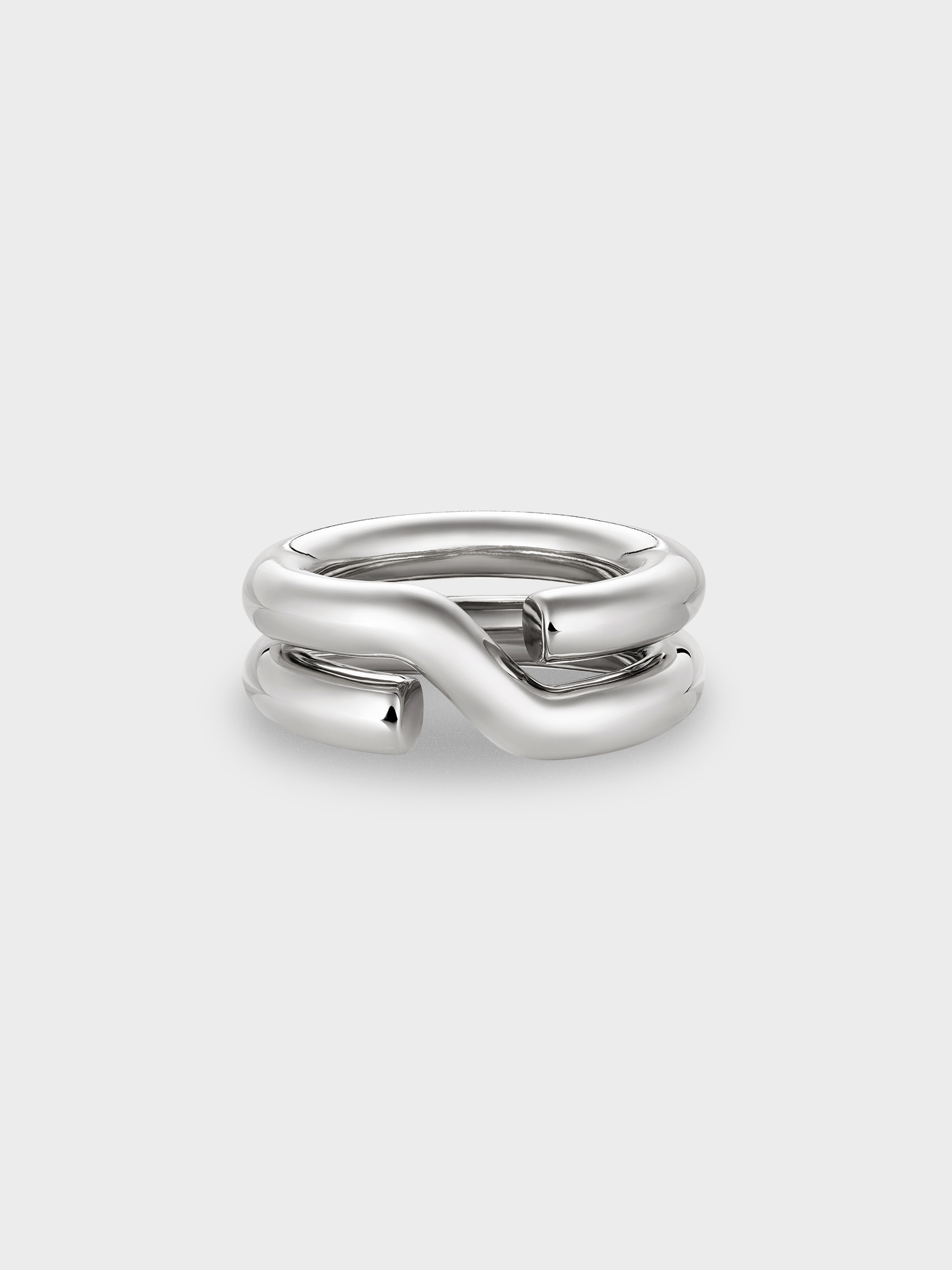 Silver keyring ring on a light grey background