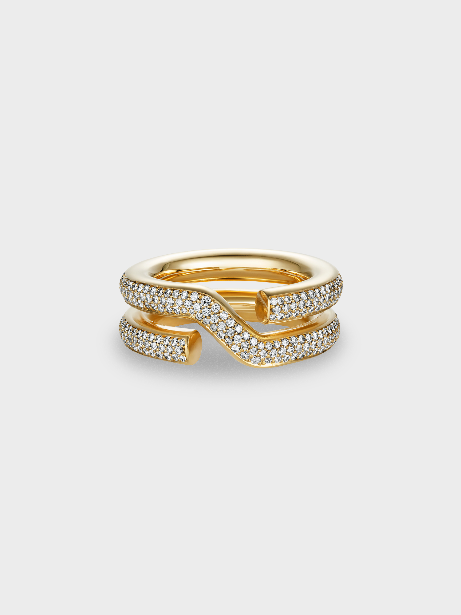 Gold keyring ring with white diamond pave on a light grey background
